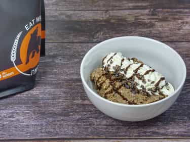 Photo of Growli Muesli with added cacao powder, cacao nibs and spray cream