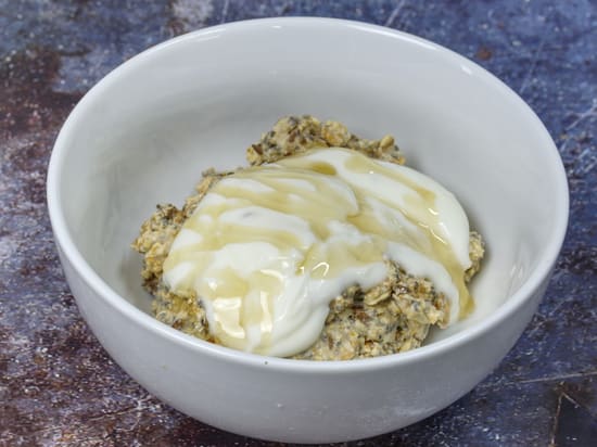 Bowl of Growli Muesli with natural yoghurt, caramel syrup and extra salt